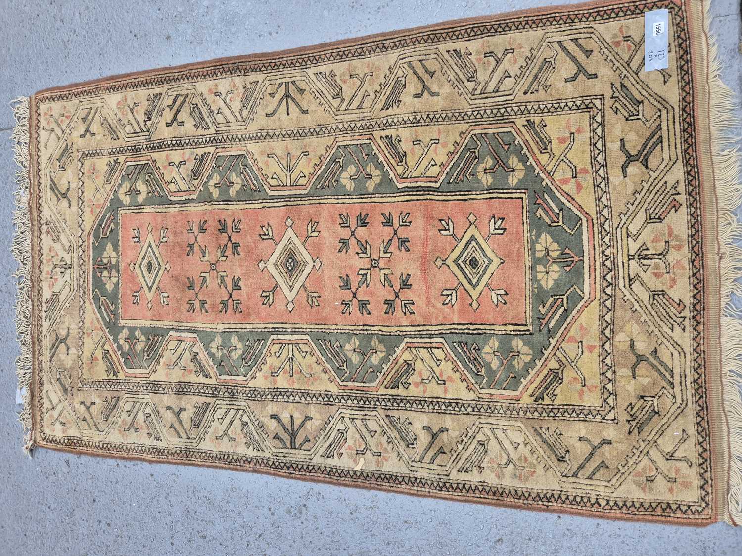 Lot 1550 - A Turkish tribal rug 203 x 123 cm