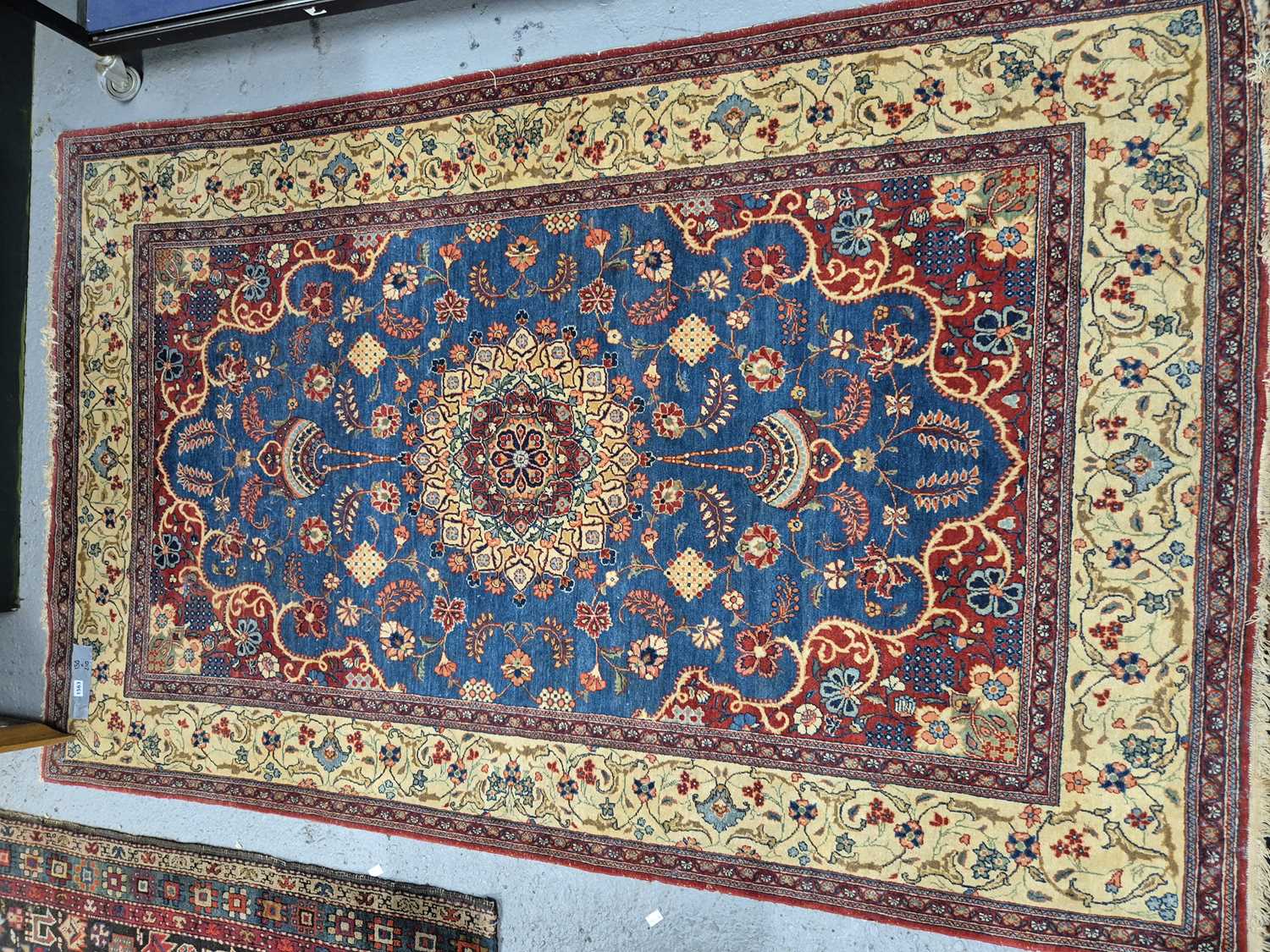 Lot 1563 - An unusual Persian Kashan rug 210 x 134 cm