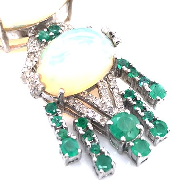 Lot 15 - An Art Nouveau-style opal, emerald and diamond...