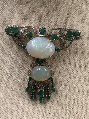 Lot 15 - An Art Nouveau-style opal, emerald and diamond...