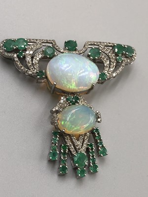 Lot 15 - An Art Nouveau-style opal, emerald and diamond...