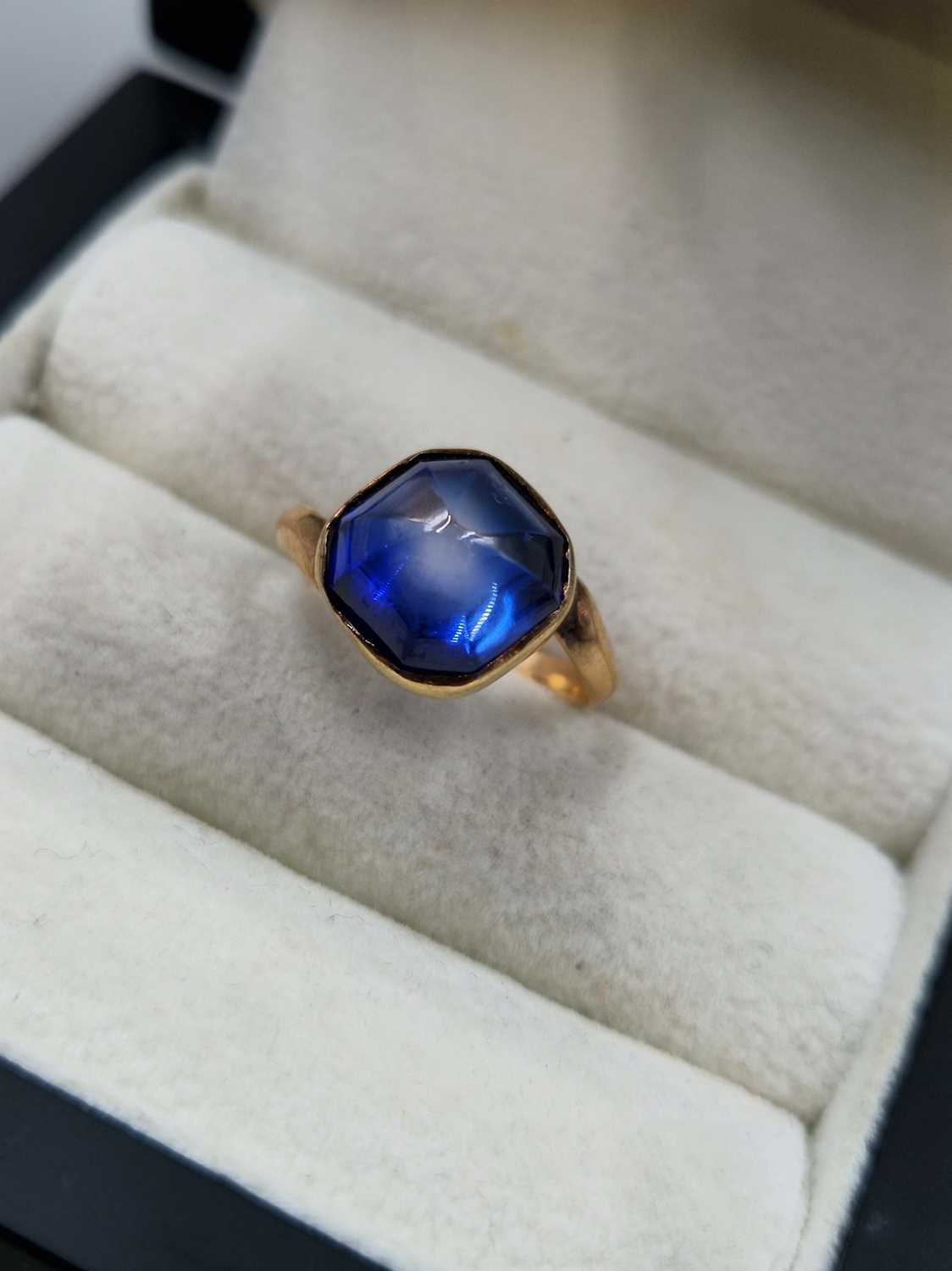 Lot 25 - A medieval-style ring set with a sugar loaf...