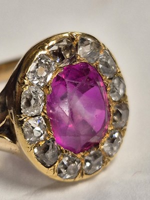 Lot 26 - An antique ruby and old cut diamond cluster...