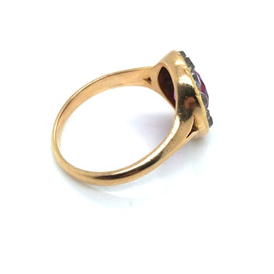 Lot 26 - An antique ruby and old cut diamond cluster...