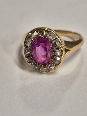 Lot 26 - An antique ruby and old cut diamond cluster...