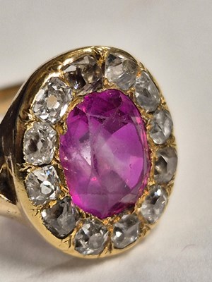 Lot 26 - An antique ruby and old cut diamond cluster...