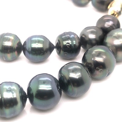 Lot 28 - A Tahitian graduated pearl necklace complete...
