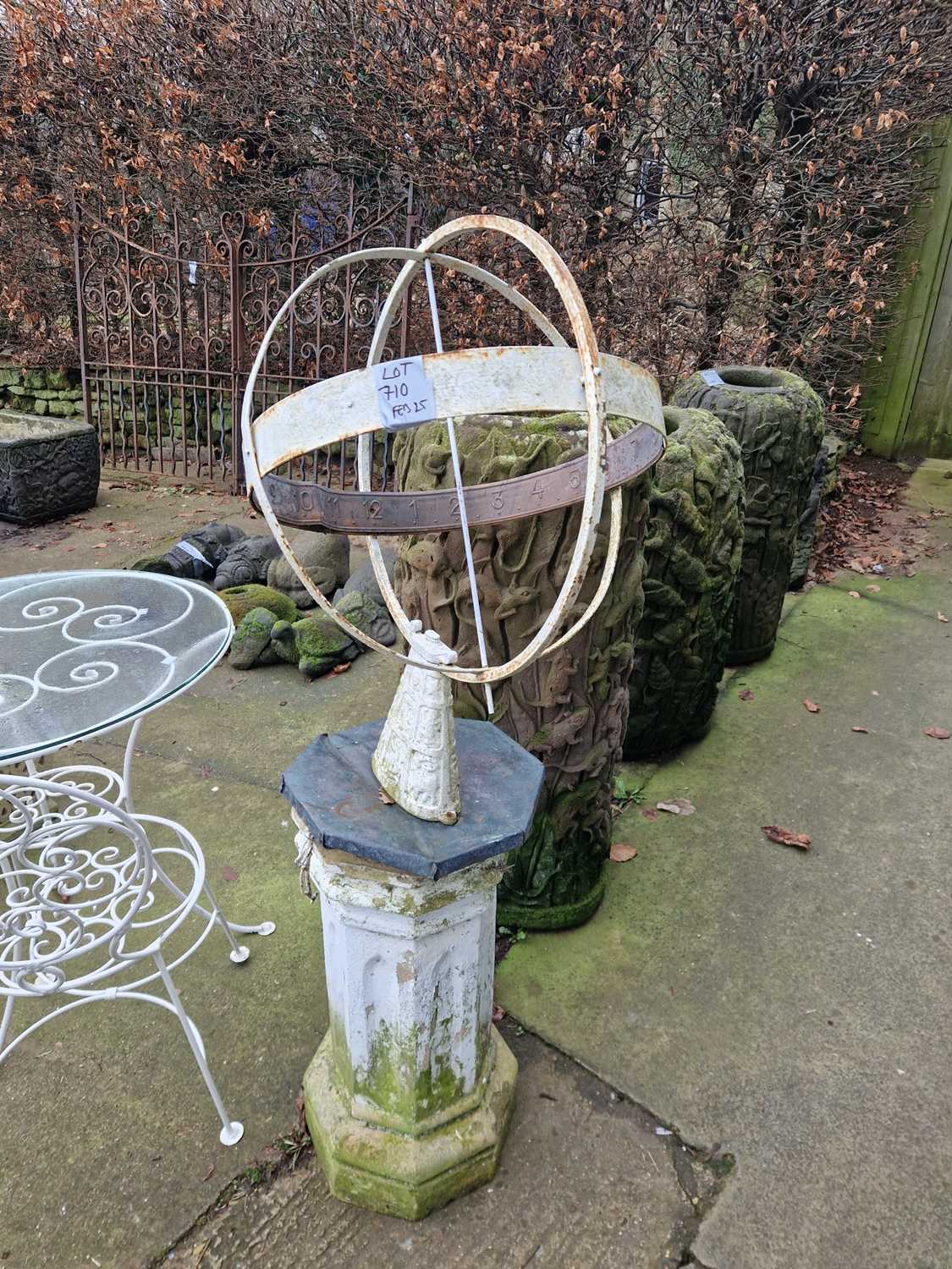 Lot 710 - A vintage weathered sundial of armillary...