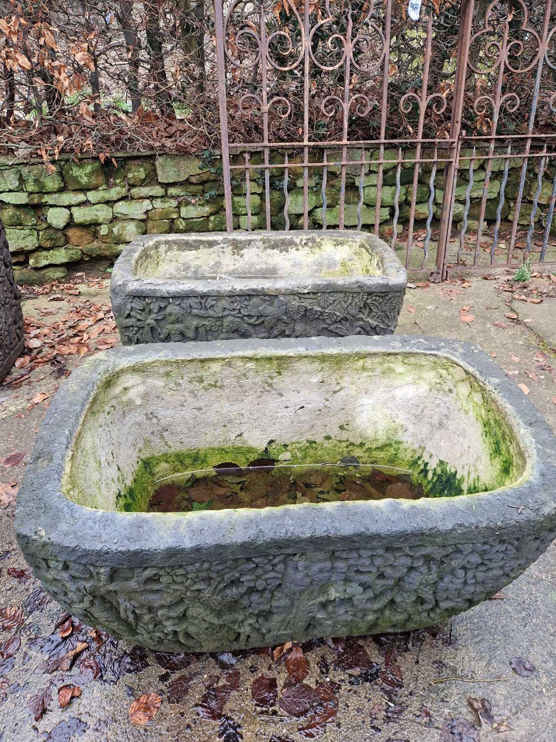 Lot 723 - A pair of Indonesian large troughs with carved...