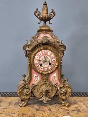 Lot 654 - A Victorian gilt brass Mantle clock with Inset...