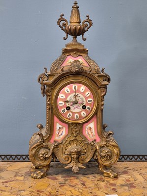 Lot 654 - A Victorian gilt brass Mantle clock with Inset...