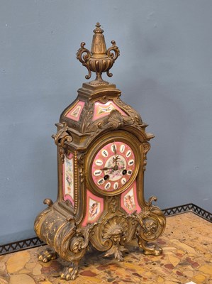 Lot 654 - A Victorian gilt brass Mantle clock with Inset...