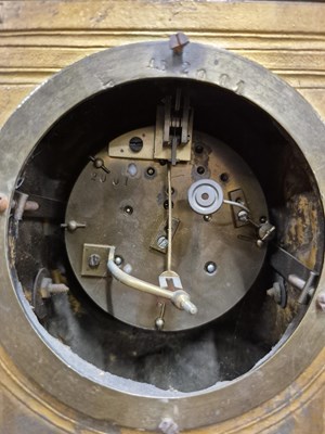 Lot 654 - A Victorian gilt brass Mantle clock with Inset...