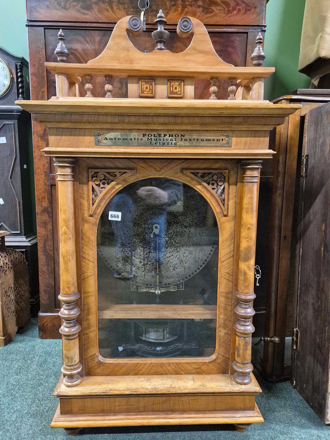 Lot 666 - A rare Coin operated Polyphon music disc...