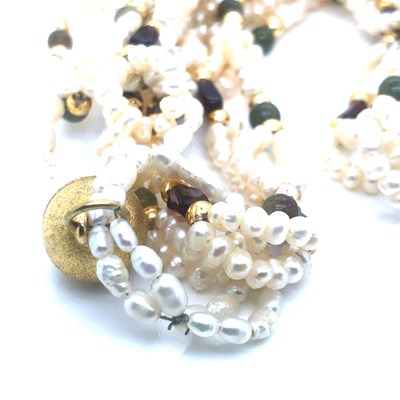 Lot 108 - A pearl and stone set double row necklace...
