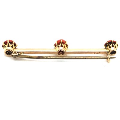 Lot 44 - An antique cabochon coral bar brooch....