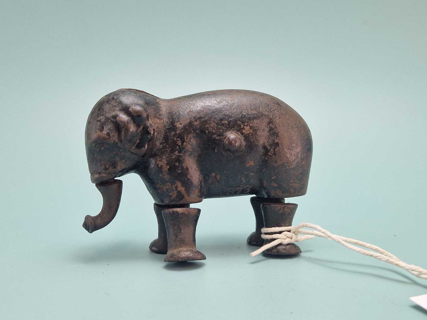 Lot 825 - Late 19th Century cast iron walking elephant...