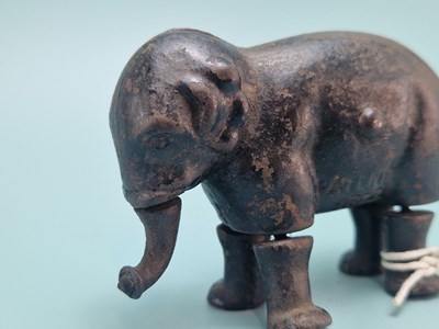 Lot 825 - Late 19th Century cast iron walking elephant...
