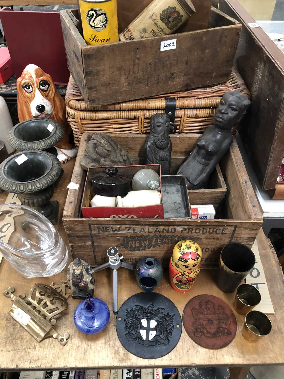 Lot 2002 - Wooden boxes, a picnic basket, carved wood...