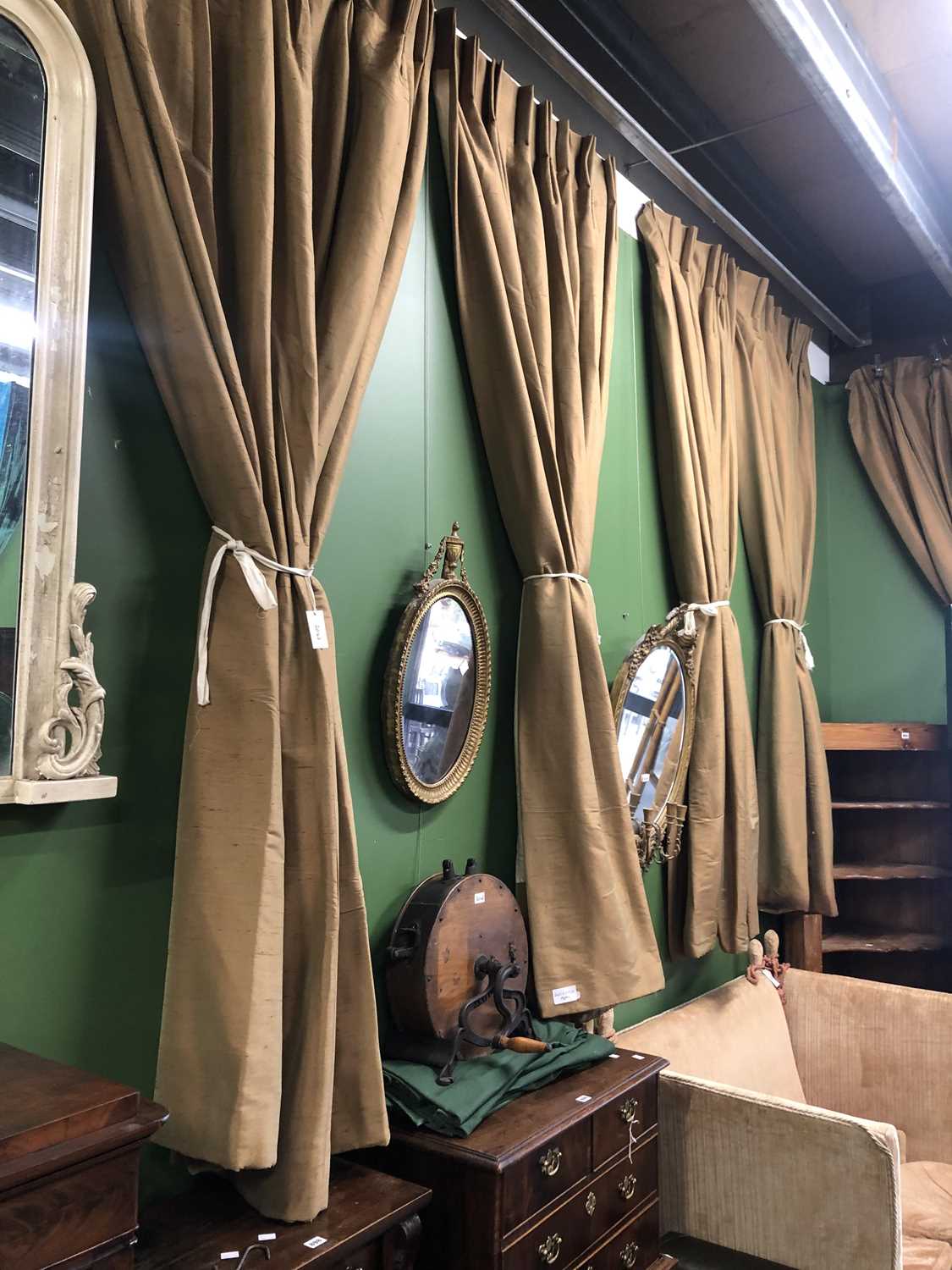 Lot 2047 - Six drops of interlined brown silk curtains...