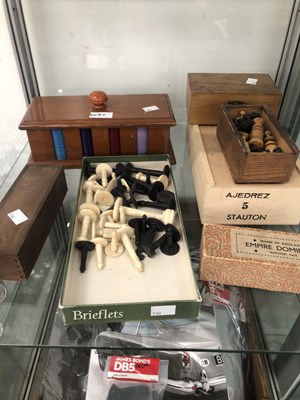 Lot 2097 - Four chess sets, two sets of dominoes together...