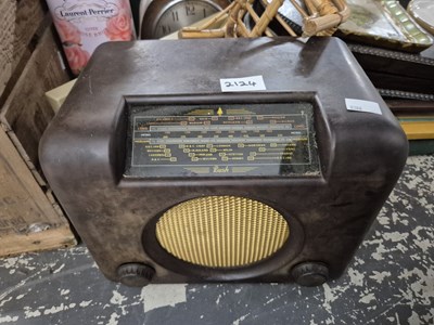 Lot 2124 - A brown bakelite cased radio, a clock, a gas...