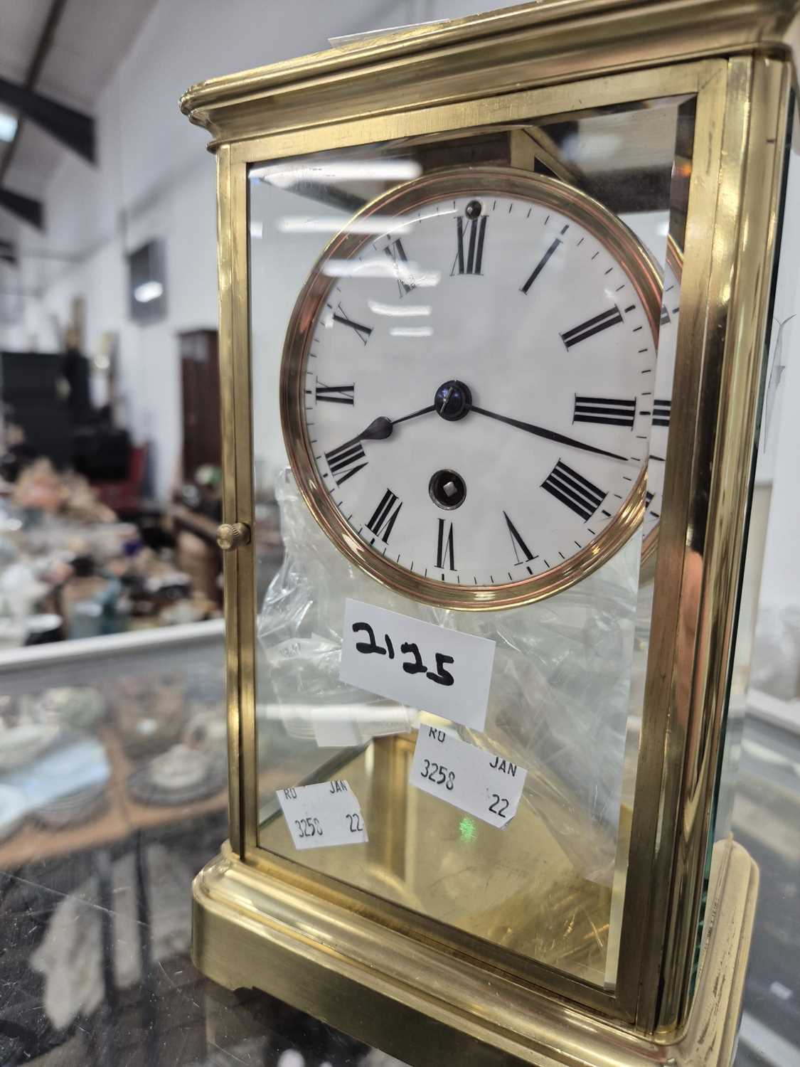 Lot 2125 - A glazed brass cased timepiece with a mercury...