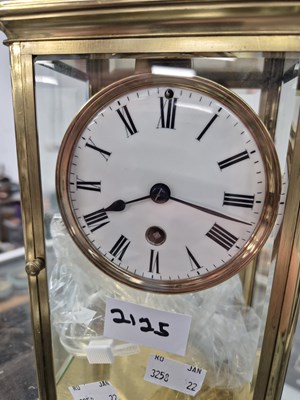 Lot 2125 - A glazed brass cased timepiece with a mercury...