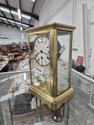 Lot 2125 - A glazed brass cased timepiece with a mercury...