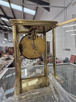 Lot 2125 - A glazed brass cased timepiece with a mercury...