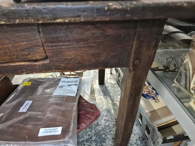 Lot 2134 - A stained pine two drawer kitchen table