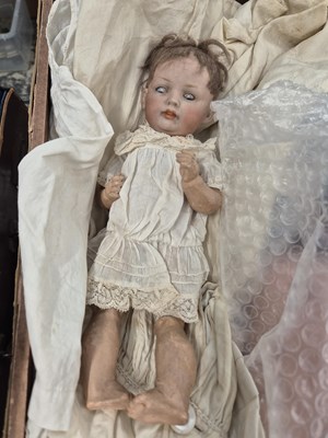 Lot 2144 - Three German bisque doll's heads with body...