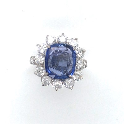 Lot 61 - A large sapphire and diamond cluster ring with...