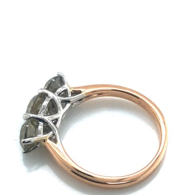 Lot 54 - An 18ct rose and white gold hallmarked diamond...