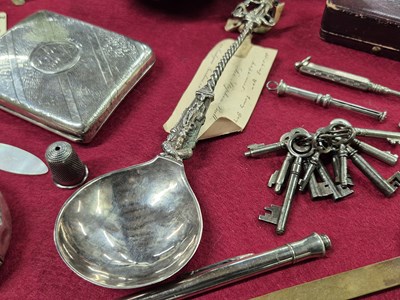 Lot 208 - A hallmarked silver cigarette case, A silver...