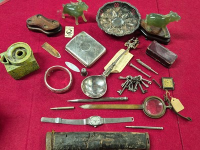Lot 208 - A hallmarked silver cigarette case, A silver...
