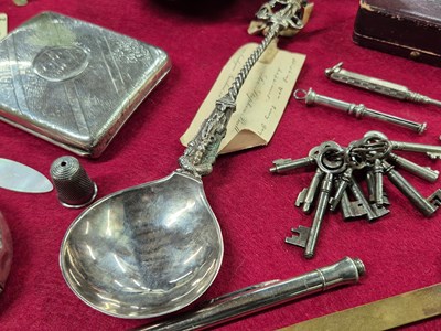Lot 208 - A hallmarked silver cigarette case, A silver...