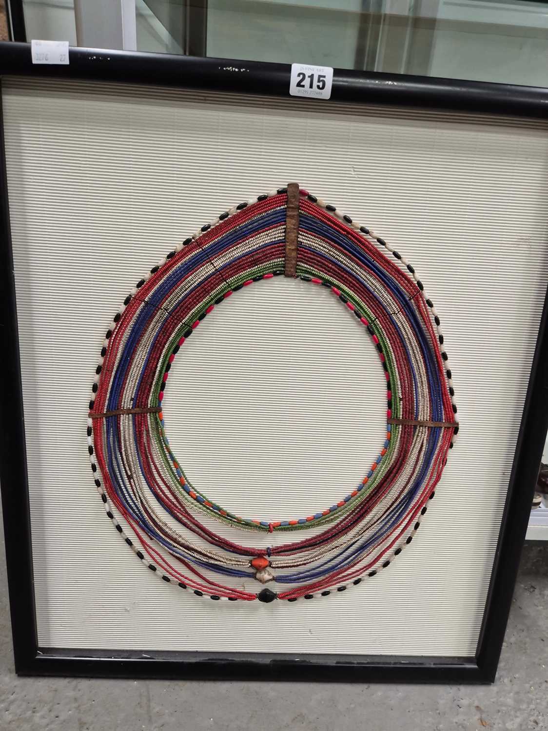 Lot 215 - An antique African beaded neck decoration....