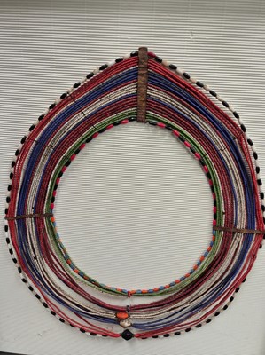 Lot 215 - An antique African beaded neck decoration....