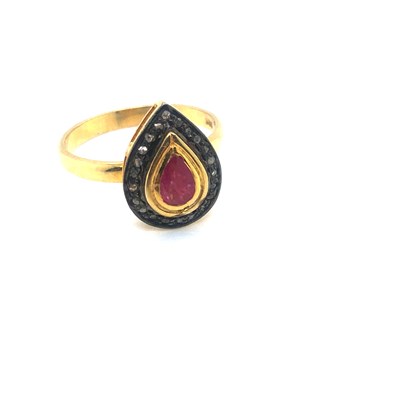 Lot 114 - A pear-shaped ring set with a pear-shaped ruby...