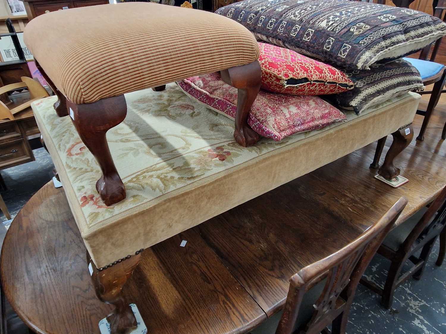 Lot 1028 - A large needlepoint upholstered banquette...