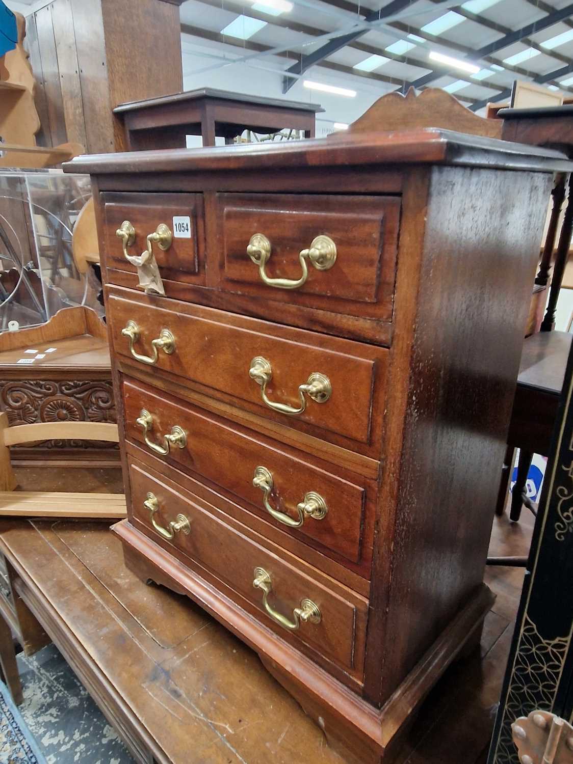 Lot 1054 - A small Georgian-style mahogany chest. H 68 W...
