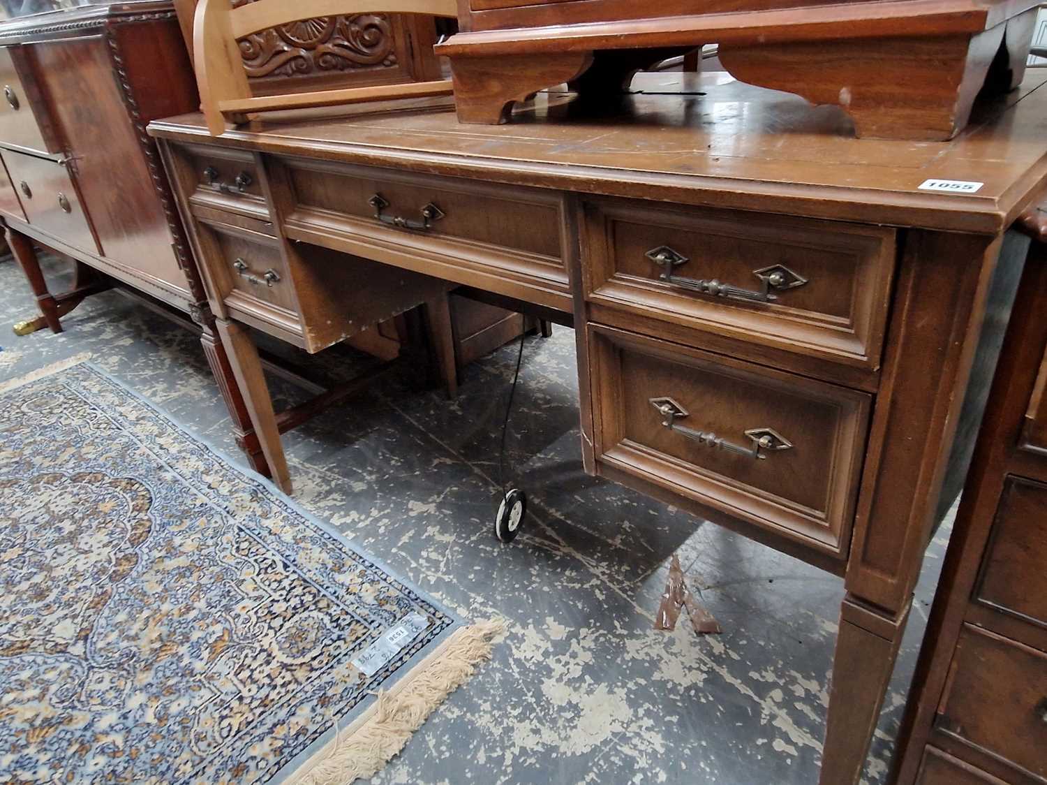 Lot 1055 - A sewing machine table fitted with an Elna...