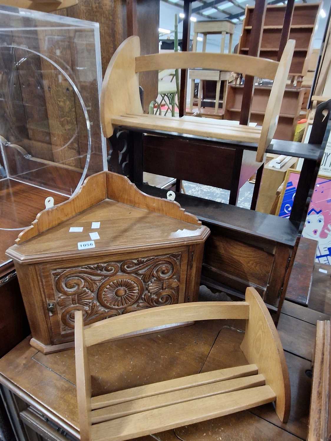 Lot 1056 - Two arts and crafts style oak book troughs, a...