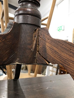Lot 1139 - A small Georgian country oak tripod table.
