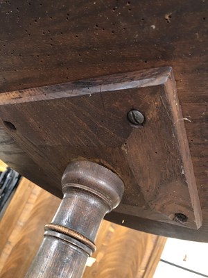 Lot 1139 - A small Georgian country oak tripod table.