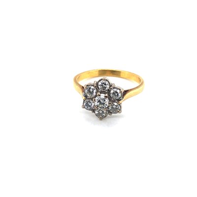Lot 63 - A vintage 18ct hallmarked gold seven-stone...