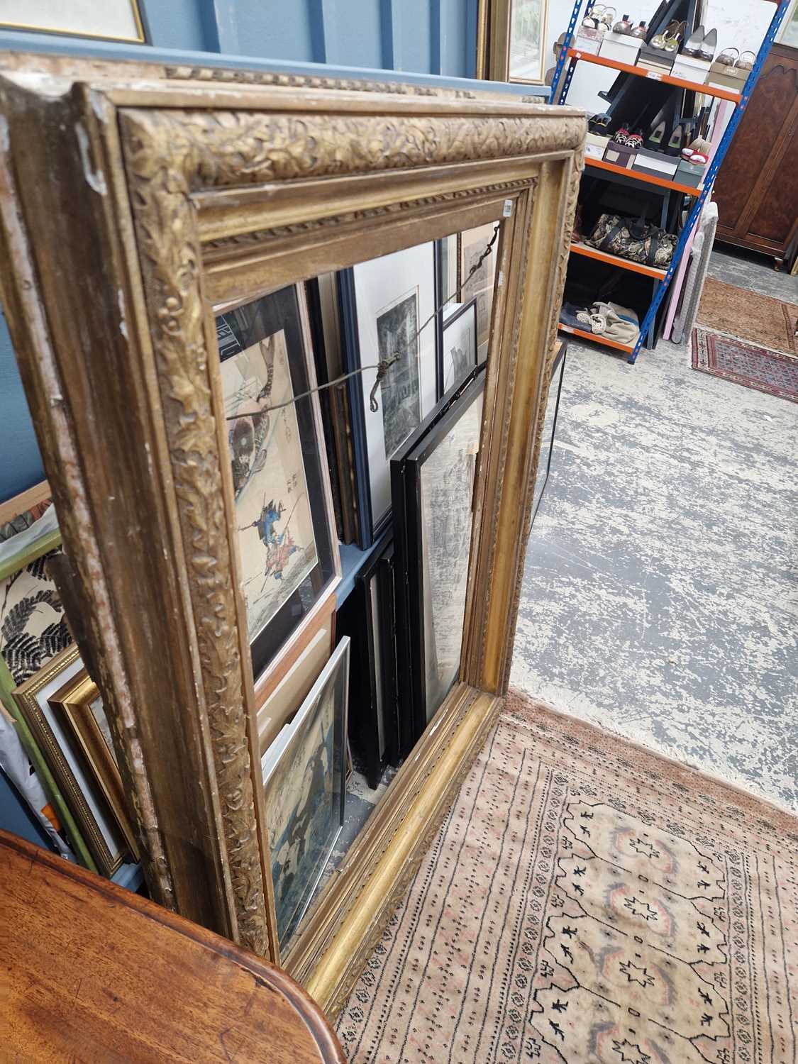Lot 1209 - A large Victorian gilt picture or mirror frame....