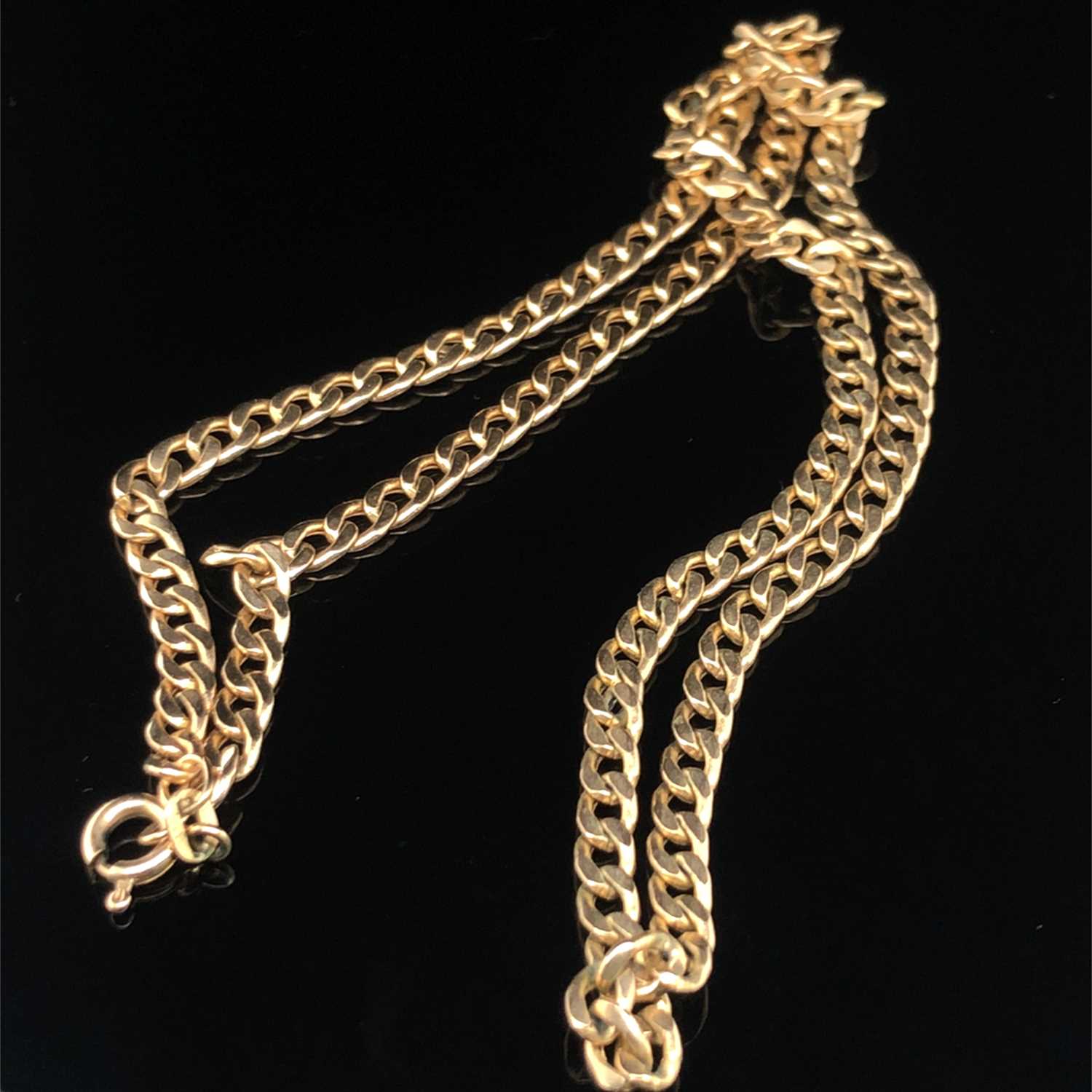 Lot 69 - A 9ct hallmarked gold curb chain. Length 47...