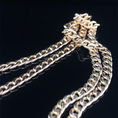 Lot 69 - A 9ct hallmarked gold curb chain. Length 47...
